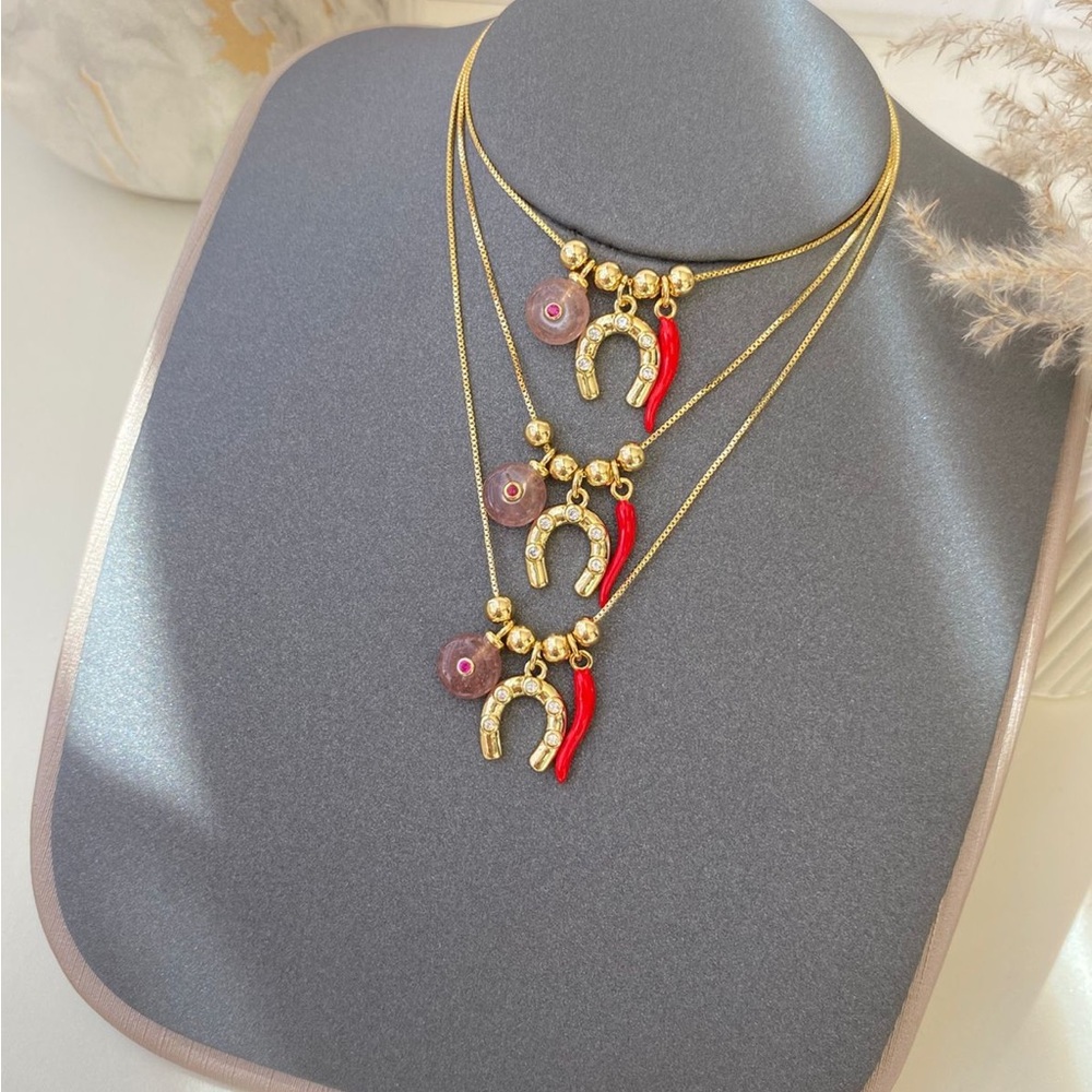 Gold Layered Necklace with Red Horn and Horseshoe Charms by